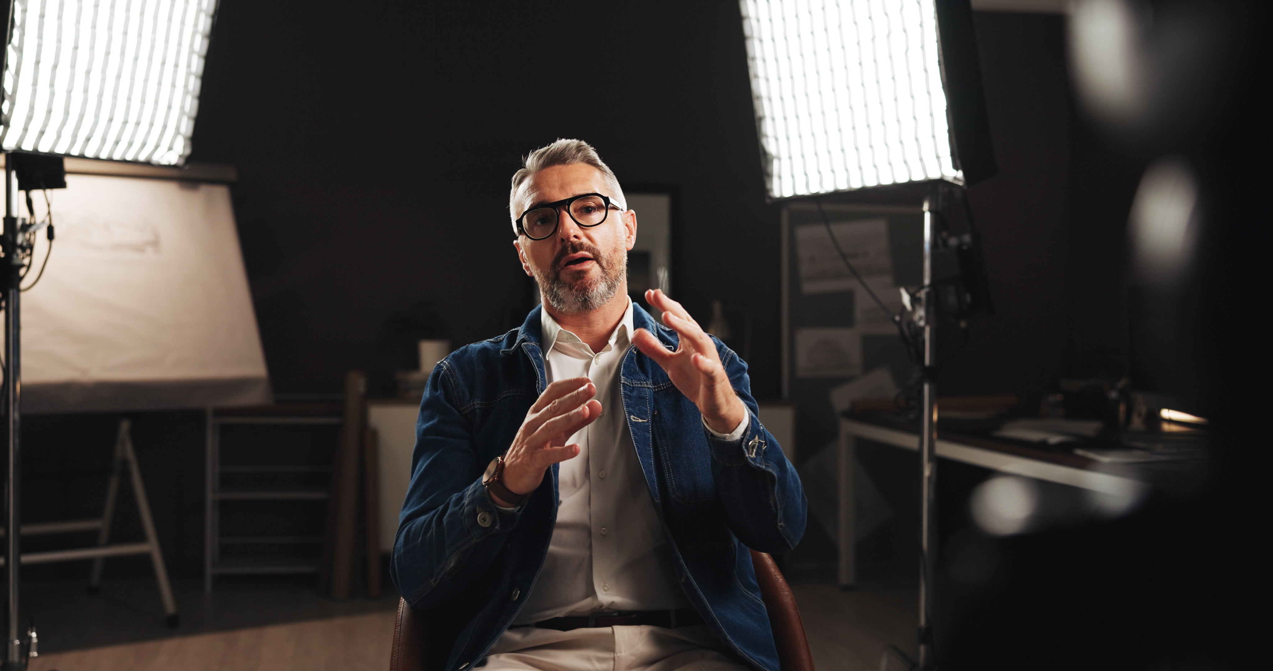 Mature man, discussion and screen with interview for talk, design tutorial or development process. .